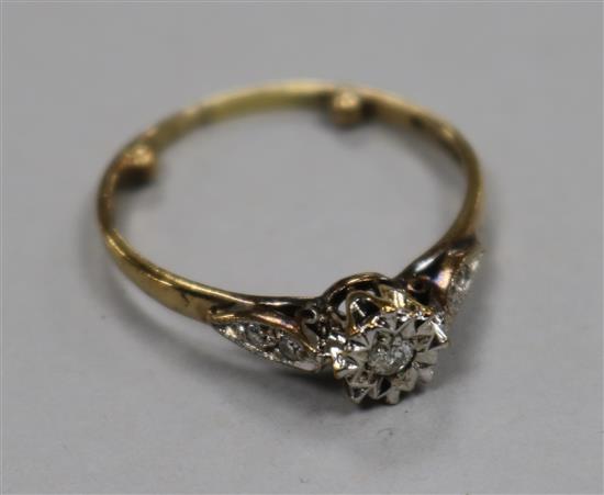 A diamond solitaire ring, illusion-set with diamond-set shoulders, 9ct gold shank, size Q.